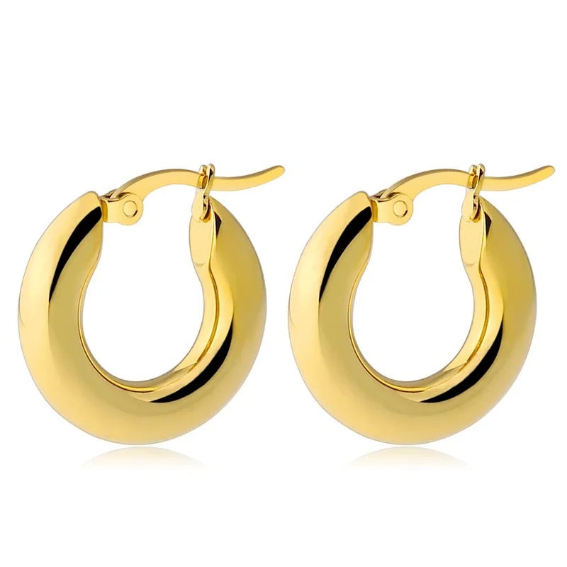 'ADA' earrings.